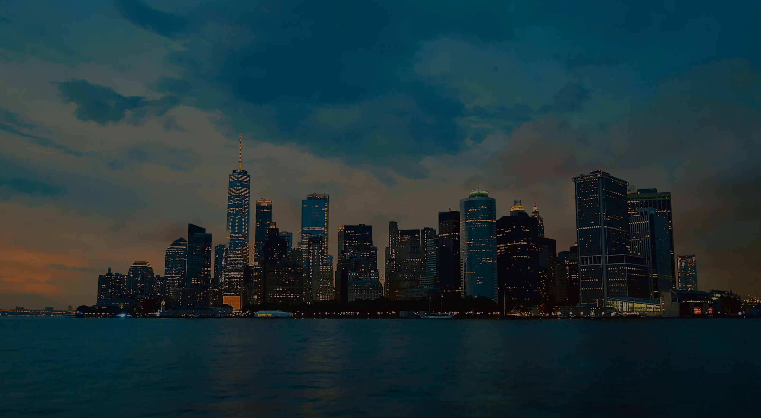 beautiful-shot-city-buildings-with-cloudy-sky-background